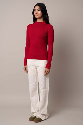 Model is wearing the long-sleeve-funnel-neck-pullover in Venetian Red