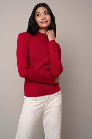 Model is wearing the long-sleeve-funnel-neck-pullover in Venetian Red