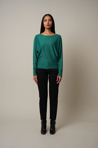 Model is wearing the Jersey Dolman Pullover in Evergreen.