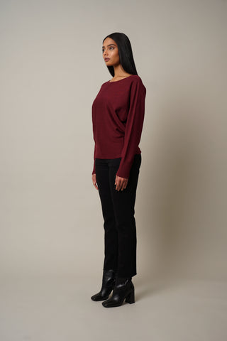 Model is wearing the Jersey Dolman Pullover in Red Mahogany.