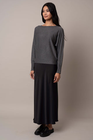 Model is wearing the long-sleeve-dolman-sweater in Charcoal Heather