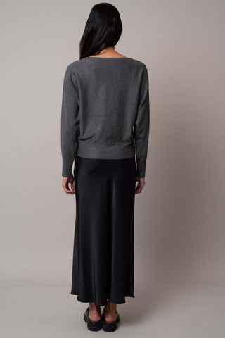 Model is wearing the long-sleeve-dolman-sweater in Charcoal Heather