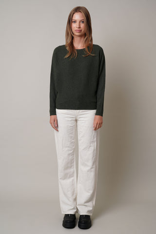 Model is wearing the dolman-boat-neck-sweater in Burnt Olive Heather