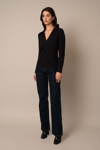 Model is wearing the Ribbed Long Sleeve Shirt With Collar in Black.