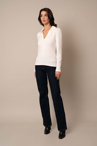 Model is wearing the Ribbed Long Sleeve Shirt With Collar in Bone.